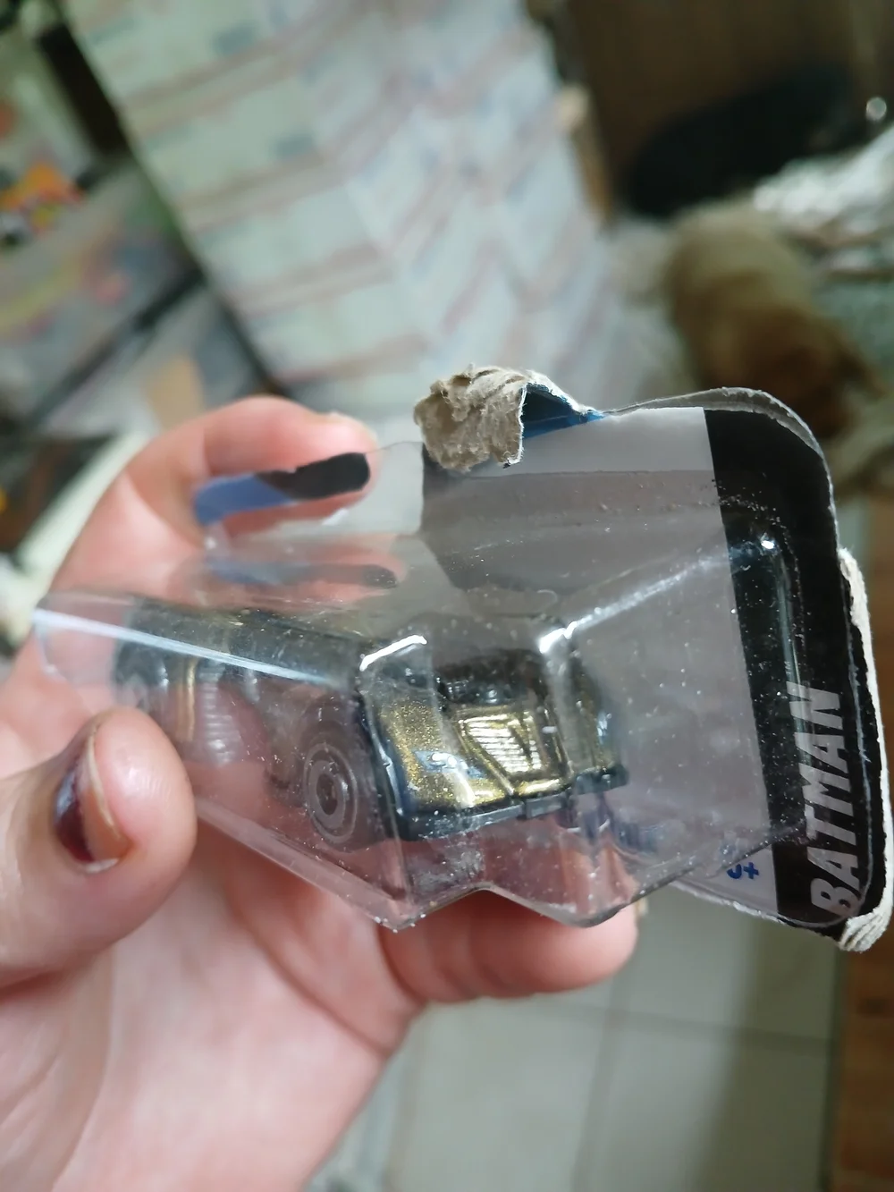 Hot Wheels Batman: Arkham Asylum Batmobile (specifically the gold/bronze variant